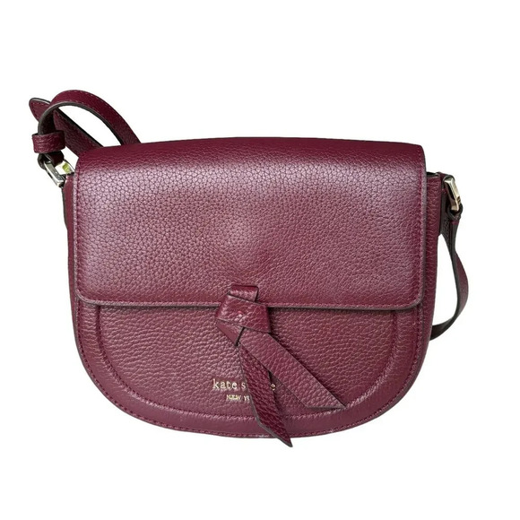 Kate Spade New York Handbags - Kate Spade New York Classic Knott Pebbled Leather Medium Saddle Bag in Grenache